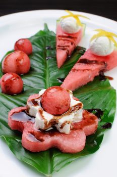 Appetizer from watermelon with ricotta soy sauce