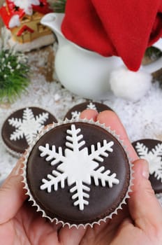 Chocolate Christmas Muffins decorated with marzipan pearl snowflake