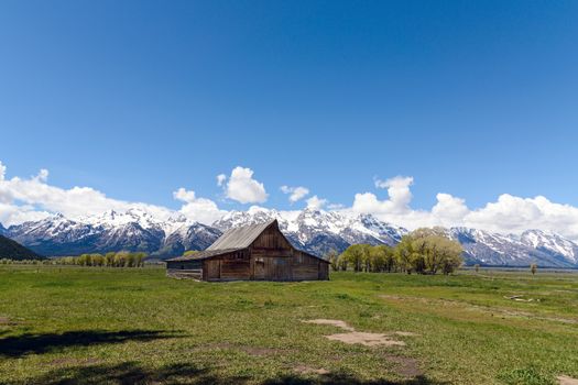 The Moulton Barn and the Teton Mountain Range in Grand Teton National Park, Wyoming.