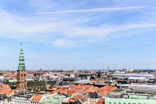 Copenhagen panoramic view from Amalienborg Palace and its square with roofs and buildings.