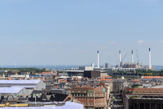 Copenhagen panoramic view from Amalienborg Palace and its square with roofs and buildings.