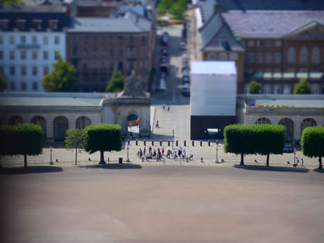 Copenhagen panoramic view from Amalienborg Palace and its square with roofs and buildings. Tilt shift.