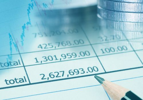 Financial reports , graph and coin. 
stock market concept.