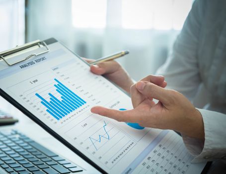 Businessmen are analyzing market data to clients or partners have been informed.