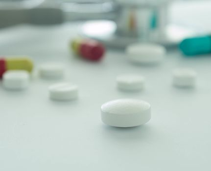 closeup pill on table. madical concept