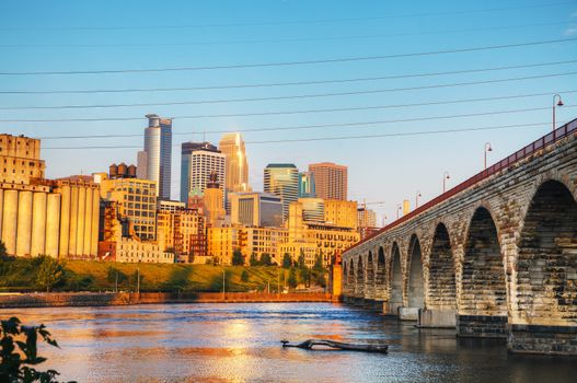 Downtown Minneapolis, Minnesota in the morning with famous Stone Arch bridge