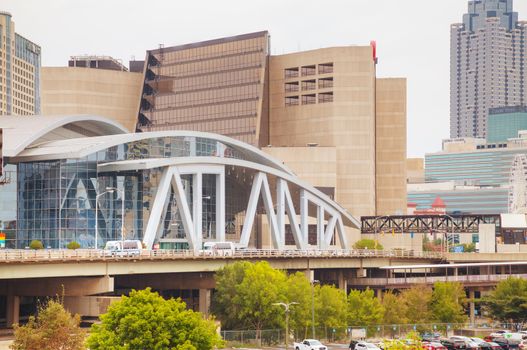 ATLANTA - AUGUST 29: Philips Arena and CNN Center on August 29, 2015 in Atlanta, GA. Philips Arena is a multi-purpose indoor arena. It was completed and opened in 1999 to replace The Omni.
