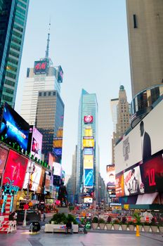 NEW YORK CITY - SEPTEMBER 04: Times square in the morning on October 4, 2015 in New York City. It's major commercial intersection and neighborhood in Midtown Manhattan at the junction of Broadway and 7th Avenue.