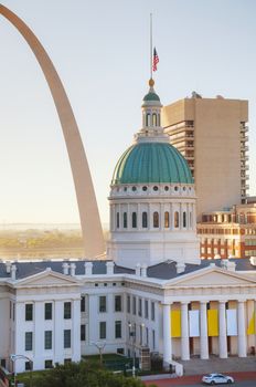 Downtown St Louis, MO with the Gateway Arch at sunrise