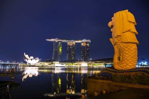 SINGAPORE - OCTOBER 30: Overview of the marina bay with the Merlion and Marina Bay Sands on October 30, 2015 in Singapore.