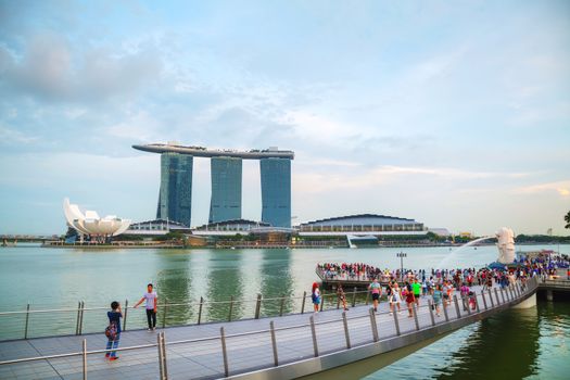 SINGAPORE - OCTOBER 30: Overview of the marina bay with the Merlion and Marina Bay Sands on October 30, 2015 in Singapore.
