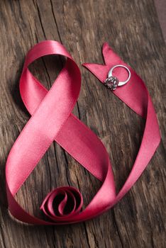 Beautiful pink ribbon with ring, gifts for women's day