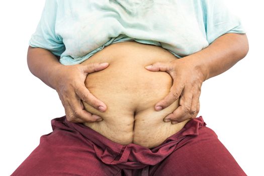asian old fat woman grasp her abdomen ( surgical scar at lower abdomen ( post cesarean section ) ) ( isolated background )
