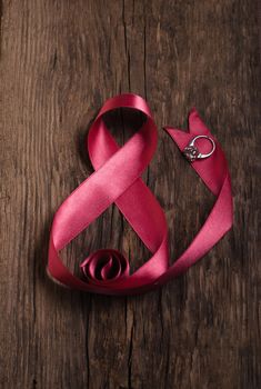 Beautiful pink ribbon with ring, gifts for women's day