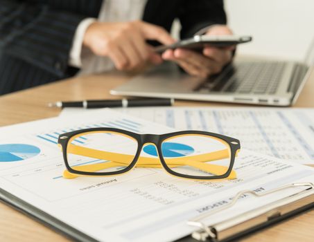 Accountants are preparing a report to present to the executive.