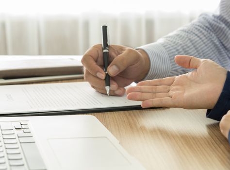 Staff recommended the benefits of insurance coverage and invite customers to sign a contract.