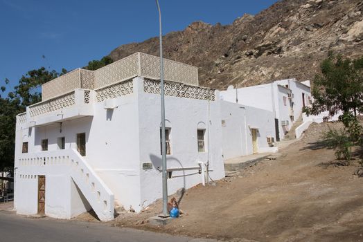 White house in the traditional style common in Muscat, Oman