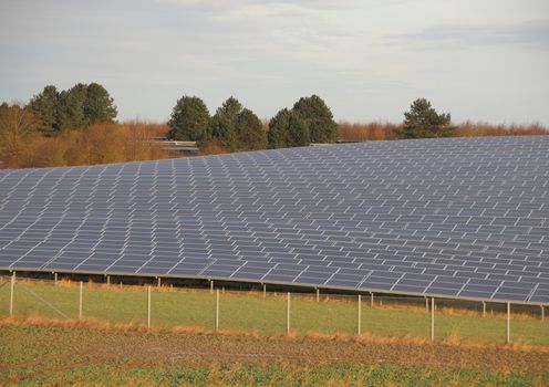 Perspective of Solar Cell Industrial Plant with Fence and Field