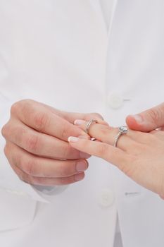 close up view of humans hands wedding