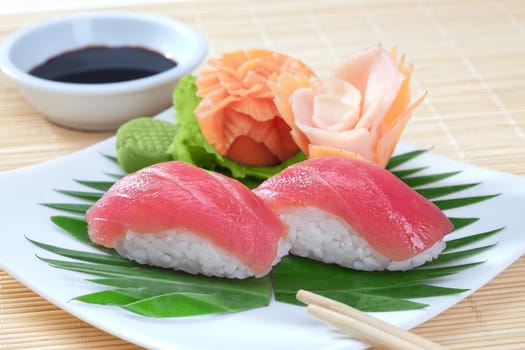 close up view  of nice fresh sushi  on color back