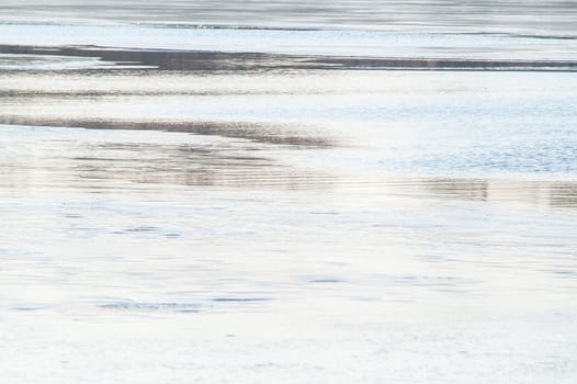 spring ice on the river to crack