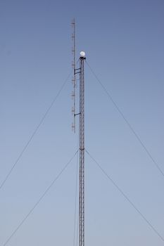 Crescent Moon over cellular antenna in thailand