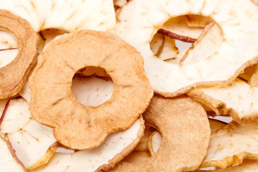 background of dried apple slices, close up.