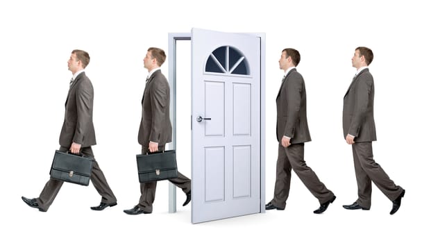 Line of businessmen going through door, business concept