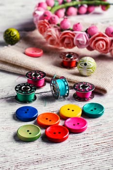 Buttons of different colors and accessories for needlework