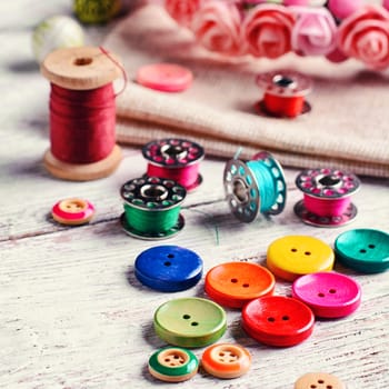 Buttons of different colors and accessories for needlework