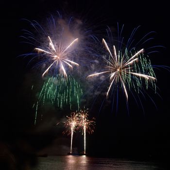 Colorful fireworks on the black sky background