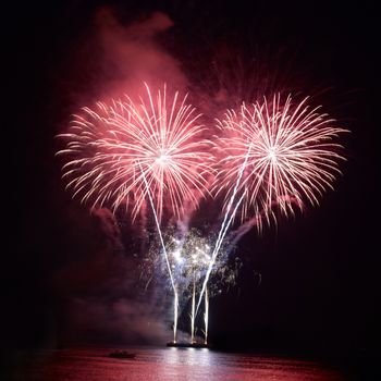 Colorful fireworks on the black sky background