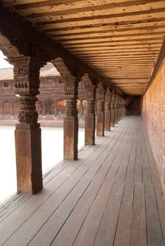 Wooden corridor in the temple of ancient Bhaktapur city, Nepal