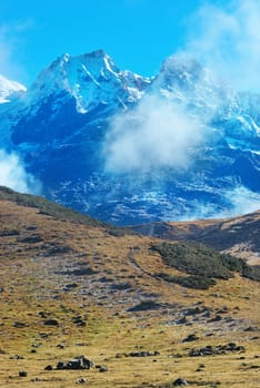 Top of High mountains, covered by snow. Kangchenjunga, India.