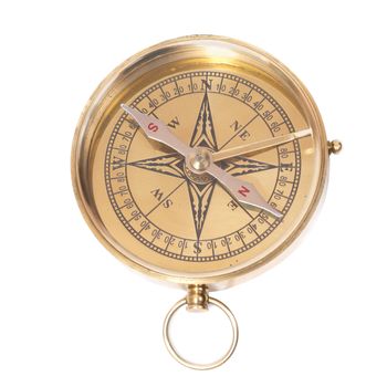 Golden ancient compass isolated on white background