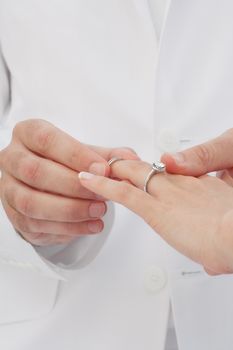 close up view of humans hands wedding