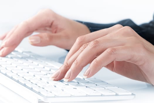 close up  view of female hands touching computer keyboard