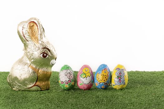 Group of colorful candy Easter eggs wrapped in foil 