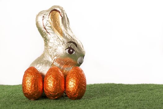 Group of colorful candy Easter eggs wrapped in foil 