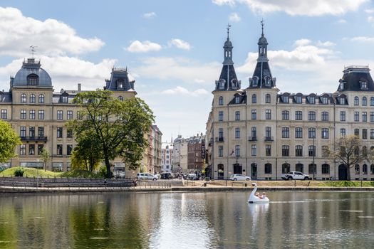 Copenhagen, Denmark - August 05, 2015 : the lakes in Copenhagen, Denmark is a row of 3 rectangular lakes curving around the western margin of the City centre, forming one the oldest and most distinctive features of the city's topography. The paths around them are popular with strollers and runners. Copenhagen, Denmark.