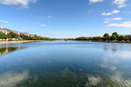 Copenhagen, Denmark - August 05, 2015 : the lakes in Copenhagen, Denmark is a row of 3 rectangular lakes curving around the western margin of the City centre, forming one the oldest and most distinctive features of the city's topography. The paths around them are popular with strollers and runners. Copenhagen, Denmark.