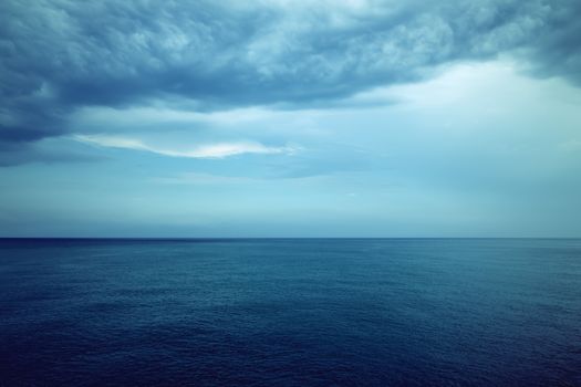 Dark blue sea and stormy clouds. Mediterranean nature.