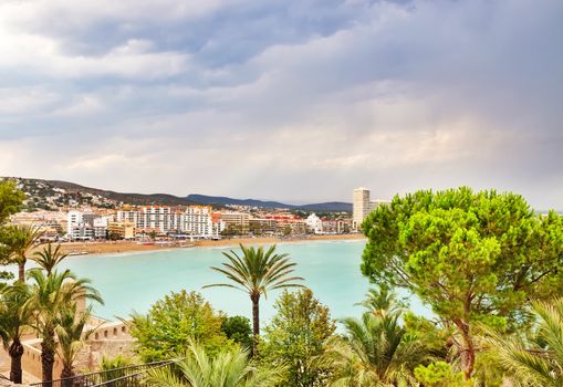 View over the coastline and hotels of Peniscola, the resort in the province of Castellon, Valencian Community, Spain.