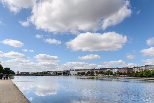 Copenhagen, Denmark - August 05, 2015 : the lakes in Copenhagen, Denmark is a row of 3 rectangular lakes curving around the western margin of the City centre, forming one the oldest and most distinctive features of the city's topography. The paths around them are popular with strollers and runners. Copenhagen, Denmark.