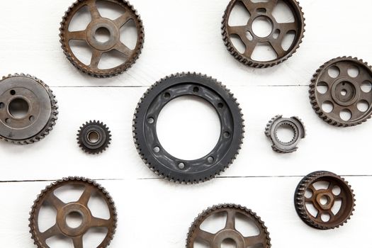 Cogwheels machinery , engineering and industry or concepts such as teamwork and search engine on white background