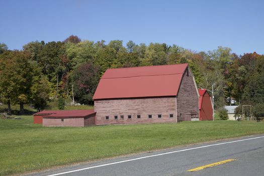 Red Wooden Farm and Autumn Season in Vermont, USA