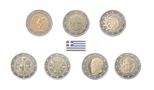 Set of commemorative coins of Greece isolated on white