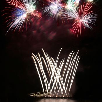 Colorful fireworks on the black sky background