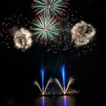 Colorful fireworks on the black sky background