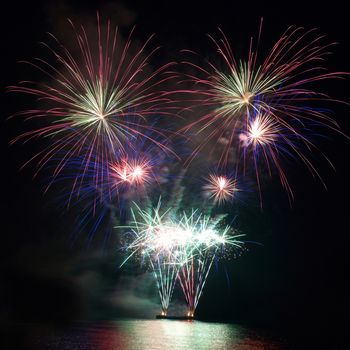 Colorful fireworks on the black sky background